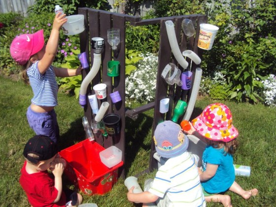 Homemade water wall outdoor kids play area